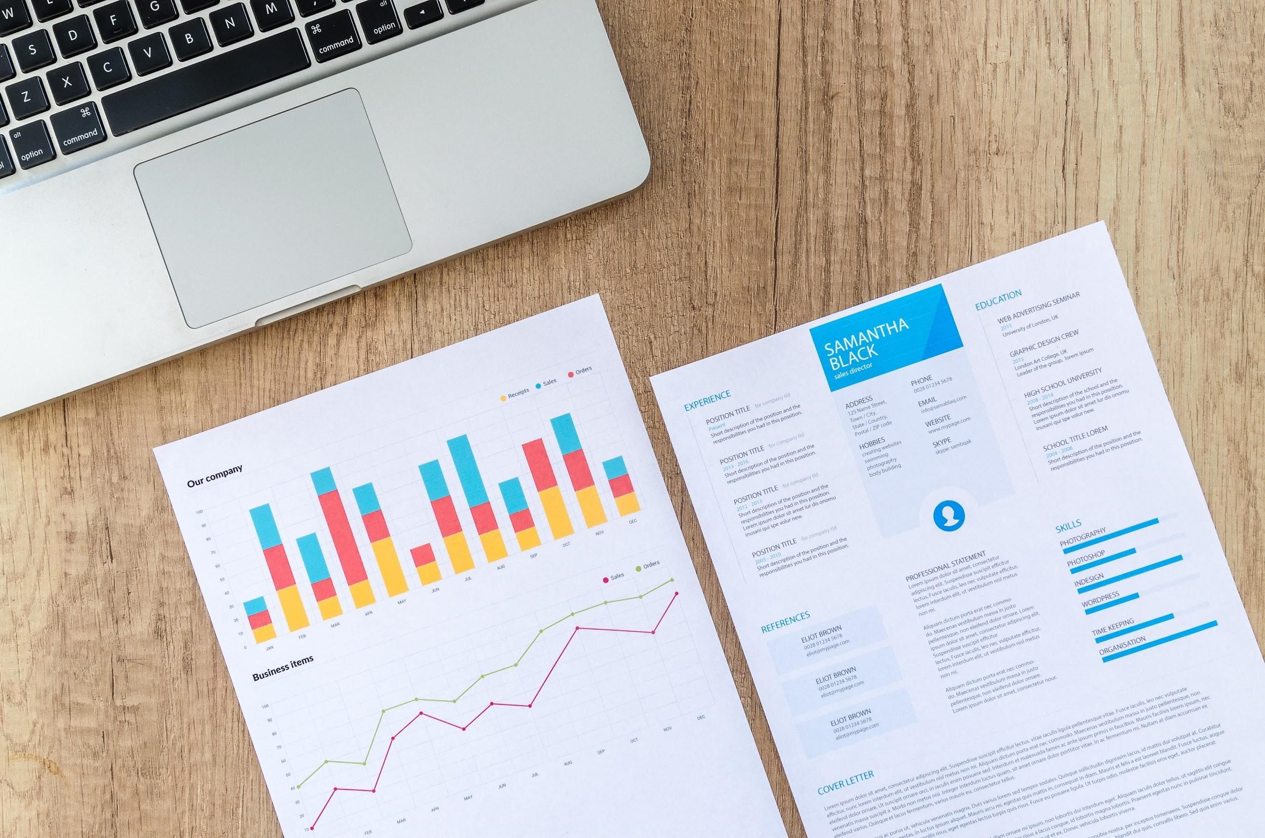 Resume image Resume and performance metrics next to laptop