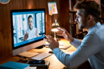 caucasian-business-man-talking-with-african-male-partner-coach-on-video-conference-call-discussing-social-distance-work-at-virtual-remote-meeting-videoconference-chat-using-pc-computer-at-home-office-stockpack-istock