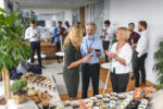 elevated-viewpoint-of-relaxed-corporate-colleagues-enjoying-savory-dishes-from-buffet-table-at-party-to-celebrate-launch-of-new-business-stockpack-gettyimages Elevated viewpoint of relaxed corporate colleagues enjoying savory dishes from buffet table at party to celebrate launch of new business.